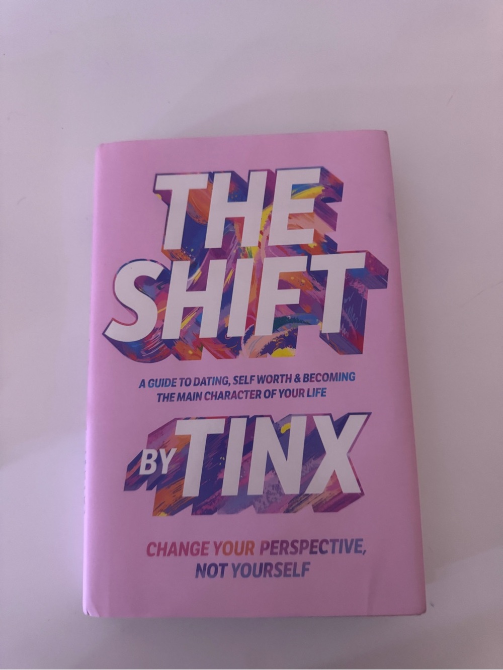 The Shift by - Pink Hardcover Self-Help Book